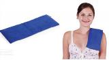 Blue rectangular heating pack on the right shoulder of a female